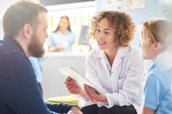 Nurse conducts patient surveys